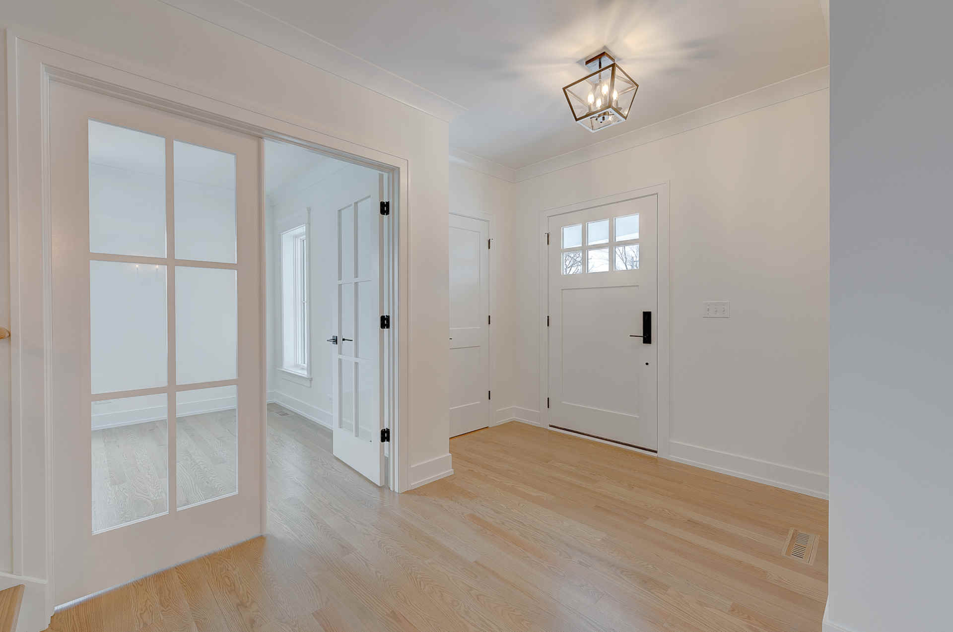 New Construction home in Downers Grove - view of front entry and double doors to study.