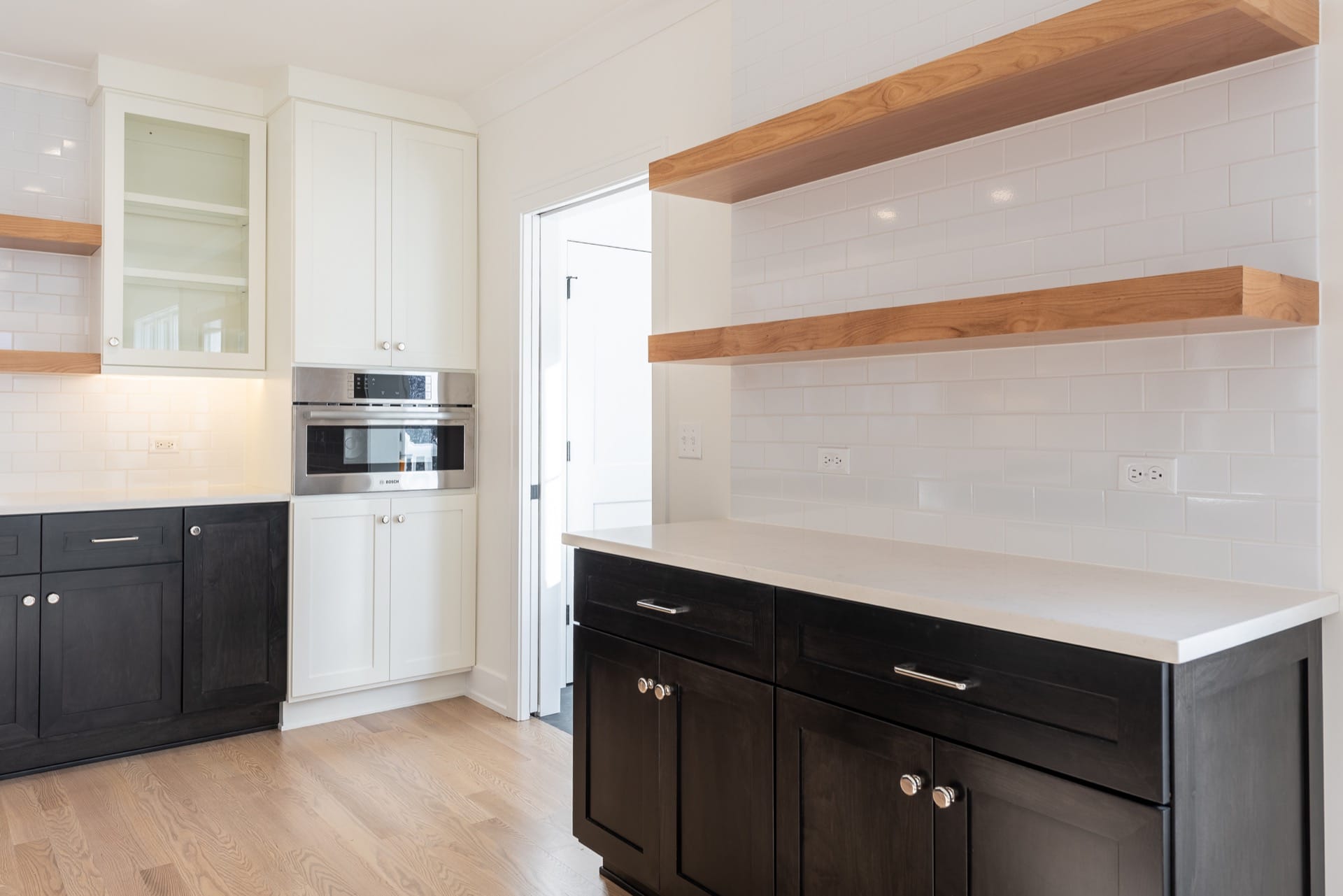 New Construction home in Downers Grove - close up of lower cabinets with upper open shelving.