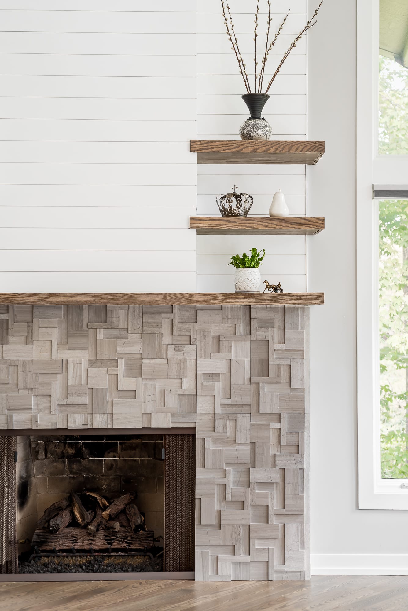 Living Room remodel in Downers Grove - view of resurfaced fireplace with mantle and open shelvinb above.
