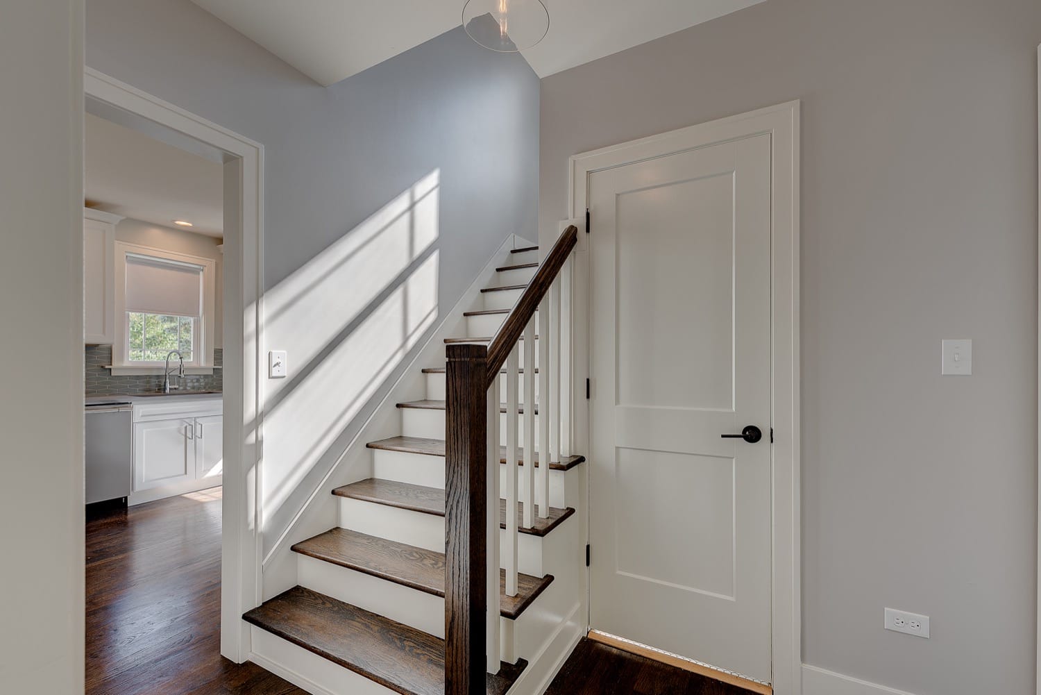 Wheaton Renovation - view of stairway and entry closet.