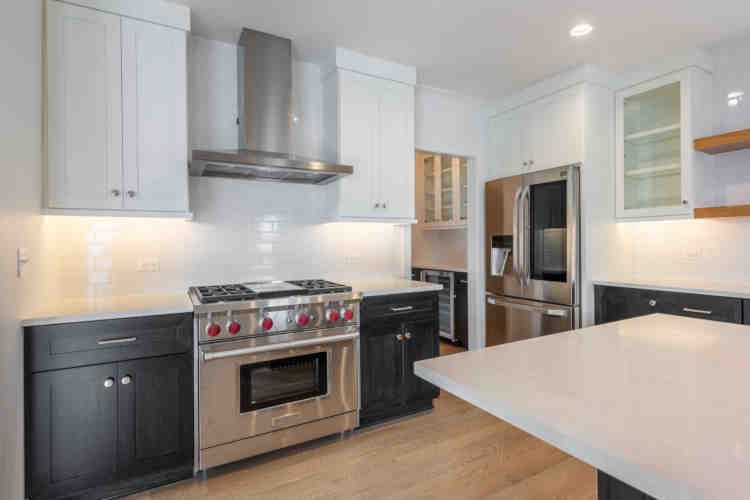 Custom Home, Renovation or Remodel blueprint spread out on desk