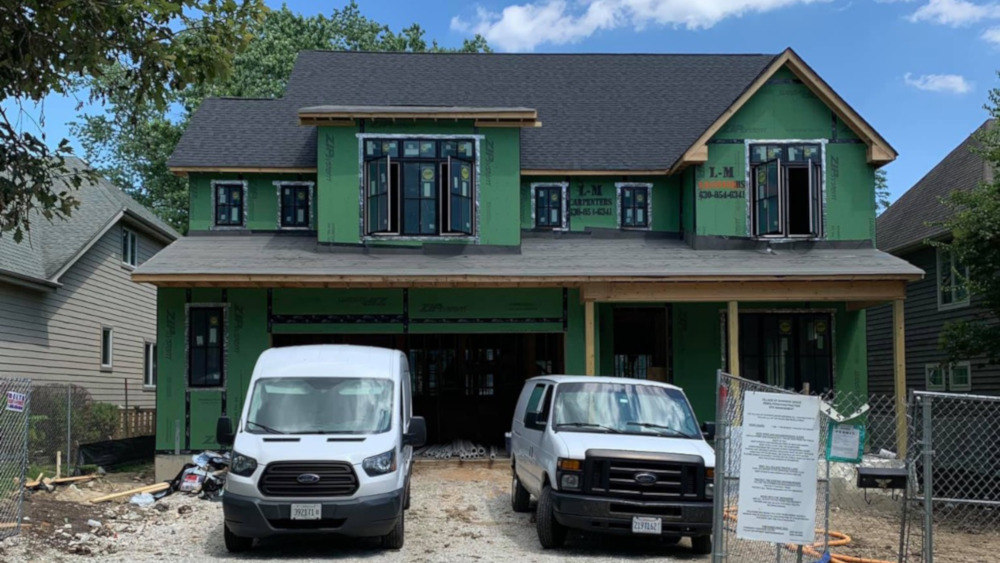 Outside framing and house wrap prior to siding being installeds | Platinum Builders